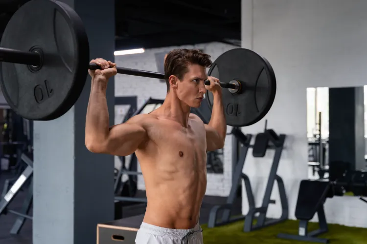 What Muscles Does the Dumbbell Overhead Press Work?