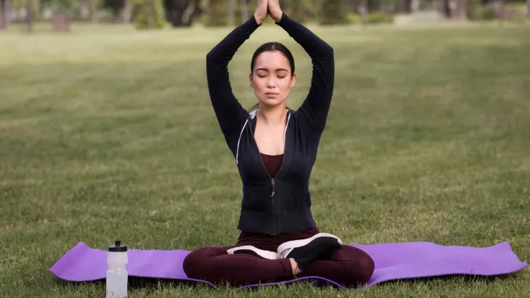 8. Seated forward bend (Paschimottanasana)