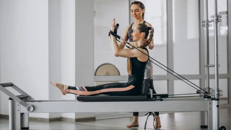 Mobility Reformer exercises: Stretching.